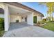 Spacious carport with ample parking and convenient access to the home's entrance at 3904 Ashwood Ln, Sarasota, FL 34232