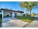 Well-maintained home featuring a spacious driveway leading to a convenient carport at 3904 Ashwood Ln, Sarasota, FL 34232