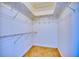 Spacious walk-in closet featuring ample shelving for optimal storage and organization at 3904 Ashwood Ln, Sarasota, FL 34232