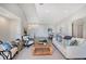 Spacious living room with an open floor plan, neutral decor, and seamless flow at 404 S Shore Dr, Sarasota, FL 34234