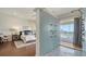 Large mosaic shower in main bedroom provides a view of the beach at 404 S Shore Dr, Sarasota, FL 34234