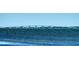 Scenic waterfront view featuring a bridge over the calm, serene water on a clear day at 404 S Shore Dr, Sarasota, FL 34234