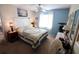 Bright bedroom with a window and neutral tones, creating a relaxing ambiance at 4206 Heron Way # B305, Bradenton, FL 34205