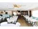 Large event space with rows of tables and chairs, perfect for community gatherings and activities at 4206 Heron Way # B305, Bradenton, FL 34205
