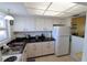Efficient kitchen featuring white cabinets and ample counter space at 4206 Heron Way # B305, Bradenton, FL 34205