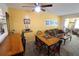 Comfortable living and dining area with ample seating and natural light at 4206 Heron Way # B305, Bradenton, FL 34205