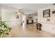 Bright and airy living room featuring polished floors and ample natural light at 440 Redwood Rd, Venice, FL 34293