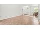 Bright room with double doors, dining table, and large window for natural light at 4449 Greenfield Ave, Sarasota, FL 34233