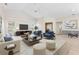 Bright and spacious living room with comfortable seating, stylish decor, and ample natural light at 4449 Greenfield Ave, Sarasota, FL 34233