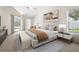 Spacious main bedroom with pool access, vaulted ceilings, and neutral color palette at 4449 Greenfield Ave, Sarasota, FL 34233