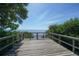 Serene boardwalk leading to a tranquil view at 5715 Inspiration Ter, Bradenton, FL 34210