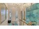 Stunning foyer with elegant decor, bright lighting, and a view of the open-concept living area at 5715 Inspiration Ter, Bradenton, FL 34210