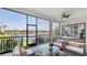 Enjoy the serene water view from this lanai with dining and lounge space and beautiful fountain views at 5715 Inspiration Ter, Bradenton, FL 34210