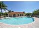 Beautiful community pool with ample seating and water features, perfect for relaxation at 5715 Inspiration Ter, Bradenton, FL 34210