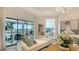Cozy sitting area with a view of the water, comfortable seating, and elegant decor at 5715 Inspiration Ter, Bradenton, FL 34210