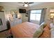 Comfortable bedroom featuring soft lighting, ample storage, and a soothing color palette at 5888 17Th W St # C23, Bradenton, FL 34207