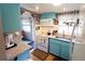 Bright kitchen boasts granite countertops, white appliances, and wood floors at 5888 17Th W St # C23, Bradenton, FL 34207