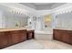 Bright primary bathroom featuring a soaking tub, dual vanity and lots of counter space at 6532 Coopers Hawk Ct, Lakewood Ranch, FL 34202