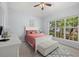 Comfortable bedroom with bright natural light and neutral tones at 6532 Coopers Hawk Ct, Lakewood Ranch, FL 34202