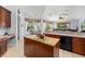 Open concept kitchen with center island, stainless steel appliances, and breakfast nook at 6532 Coopers Hawk Ct, Lakewood Ranch, FL 34202