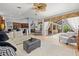 Open living space offers comfortable seating and inviting views of the outdoors at 6532 Coopers Hawk Ct, Lakewood Ranch, FL 34202