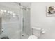 Modern bathroom with a frameless glass shower and a white vanity at 6940 W Country Club N Dr # V-77, Sarasota, FL 34243