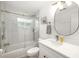 Modern bathroom featuring tiled shower, updated vanity and glass shower door at 6940 W Country Club N Dr # V-77, Sarasota, FL 34243