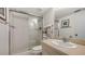 Updated bathroom with glass-enclosed tiled shower and modern fixtures at 6951 Gulf Of Mexico Dr # 14, Longboat Key, FL 34228