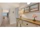 Inviting hallway with beach-themed decor and natural light, leading to ocean views at 6951 Gulf Of Mexico Dr # 14, Longboat Key, FL 34228