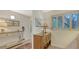 Inviting hallway boasting stylish decor, rich hardwood floors, and great natural light at 6951 Gulf Of Mexico Dr # 14, Longboat Key, FL 34228