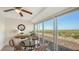 Sunny lanai with comfortable seating and panoramic views of the beach and ocean at 6951 Gulf Of Mexico Dr # 14, Longboat Key, FL 34228