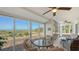 Bright lanai with comfortable seating and gorgeous views of the sandy beach and Gulf at 6951 Gulf Of Mexico Dr # 14, Longboat Key, FL 34228