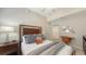 Comfortable bedroom includes a desk and ample natural light for a versatile living space at 7019 Grand Estuary Trl # 101, Bradenton, FL 34212