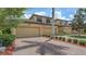 Charming two-story townhome with a well-maintained brick driveway and attached two-car garage at 7019 Grand Estuary Trl # 101, Bradenton, FL 34212