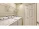 Clean and efficient laundry area with modern washer and dryer units at 7019 Grand Estuary Trl # 101, Bradenton, FL 34212