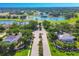 Aerial view of Serenoa community showcasing golf course, lakes, and beautiful homes at 7441 Myrica Dr, Sarasota, FL 34241