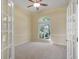 Bright office space with neutral colors, window views, and plenty of room to work at 7441 Myrica Dr, Sarasota, FL 34241