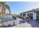 Enjoy the beautiful lakeside patio with views of the golf course, perfect for relaxing and entertaining guests at 7441 Myrica Dr, Sarasota, FL 34241