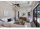 Bright living room with a sitting area, and views of the pool area at 7532 Greystone St, Lakewood Ranch, FL 34202