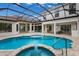 Beautiful screened-in pool with spa at 7532 Greystone St, Lakewood Ranch, FL 34202
