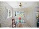 Charming breakfast nook with scenic water view and floral wallpaper at 7620 Westmoreland Dr, Sarasota, FL 34243