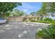 Charming home with an attached two-car garage, lovely landscaping, and a spacious driveway at 7620 Westmoreland Dr, Sarasota, FL 34243