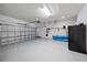 Spacious two car garage with epoxy flooring, storage and bright lighting at 7743 Ridgelake Cir, Bradenton, FL 34203