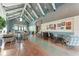 Spacious lobby area with stylish seating arrangements and decor, creating a welcoming atmosphere at 8059 Waterbend Trl, Sarasota, FL 34240
