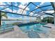 Beautiful screened pool area with a lake view and a custom turtle inlay on the pool floor at 8059 Waterbend Trl, Sarasota, FL 34240