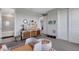 bedroom with fun ball pit, neutral walls and view into attached bathroom at 8355 Velda Trl, Sarasota, FL 34241