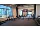 Community gym space with weightlifting equipment, free weights and large mirrors at 8355 Velda Trl, Sarasota, FL 34241