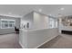 Bright and airy loft area with neutral walls, plush carpeting, and plenty of natural light at 8355 Velda Trl, Sarasota, FL 34241