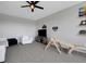 playroom shows climbing structure, TV, and cinema themed decor at 8355 Velda Trl, Sarasota, FL 34241