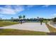 Aerial view of a sand volleyball court in a planned community at 8355 Velda Trl, Sarasota, FL 34241